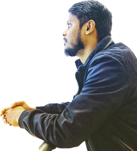 Rahul Kant Ravi in a dark jacket, looking into the distance